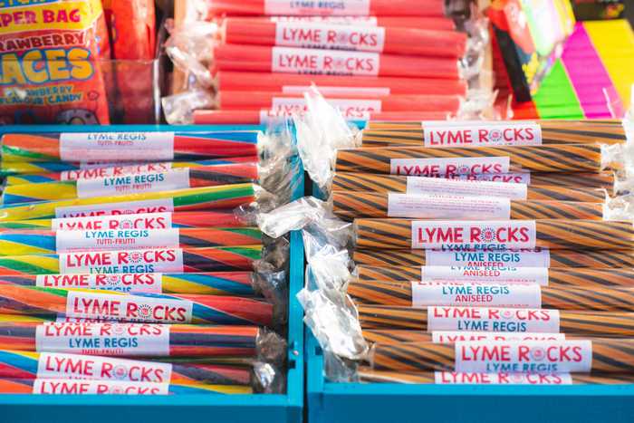Lyme Rocks Our Shop image, showing bundles of Lyme Rocks branded sticks of rock
